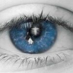 eye with holy person image in iris
