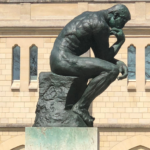 Statue of person thinking